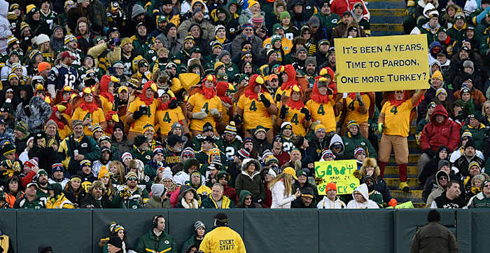 Eventually, some Packers fans forgave Favre for playing for the rival Vikings, as this sign showed at a November 2014 game at Lambeau Field. (Brian D. Kersey/Getty Images)